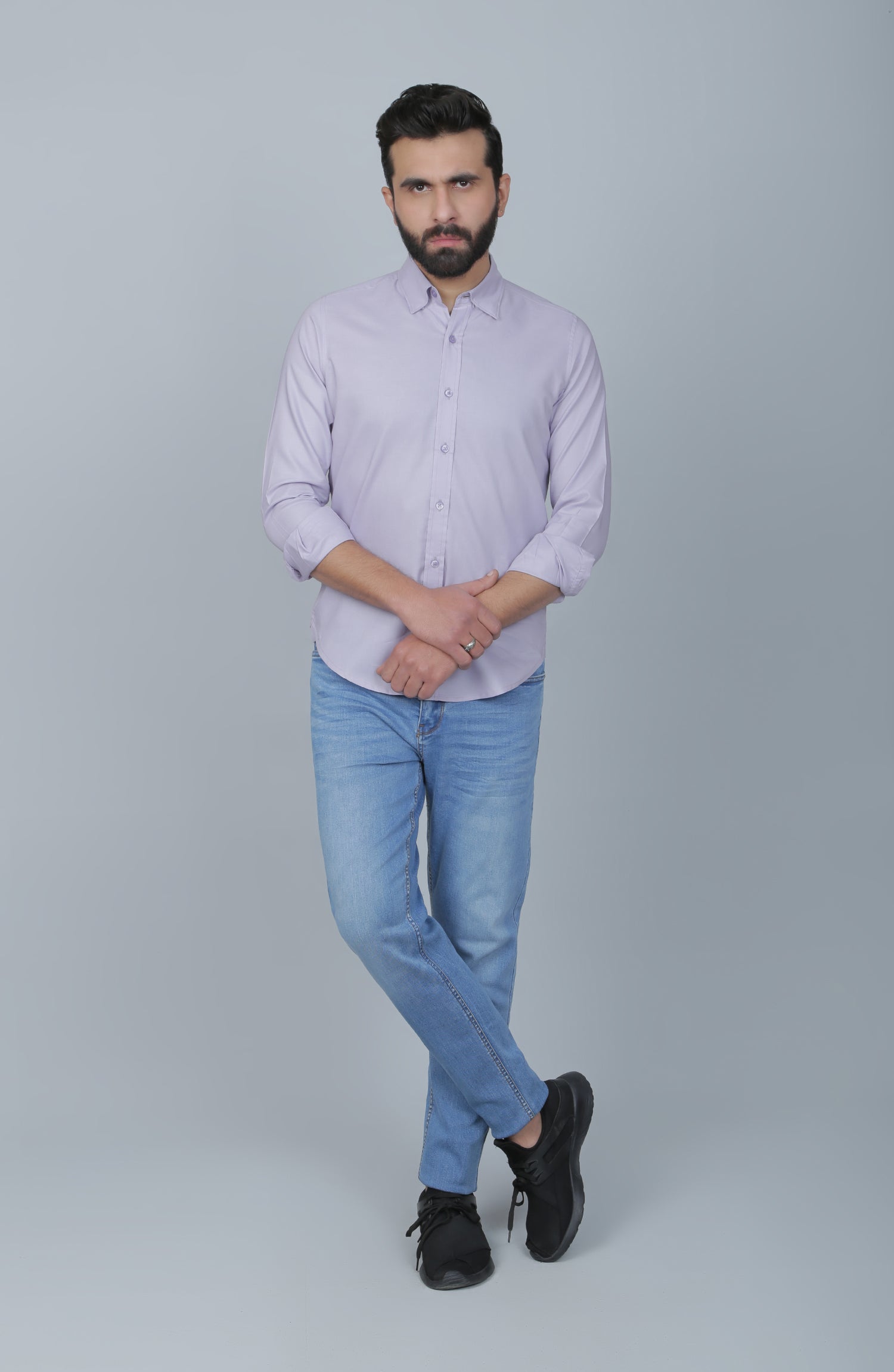 Man in purple dress shirt and blue denim jeans sitting photo – Free  Chandigarh Image on Unsplash